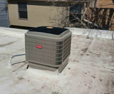 Residential AC Condenser Unit on Roof